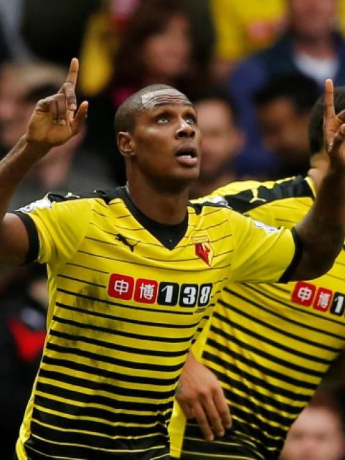 Watford's Odion Ighalo celebrates scoring his side's third goal against Liverpool. Photo Reuters