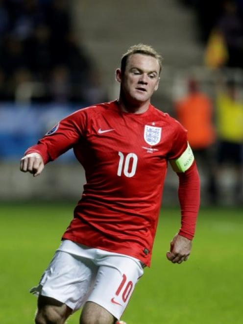 Wayne Rooney controls the ball against Estonia at the A. Le Coq Arena in Tallinn. REUTERS/Ints...