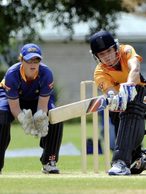 Wellington batsman Sarah Taylor sweeps the ball during a one-day game against Otago in Mosgiel on...