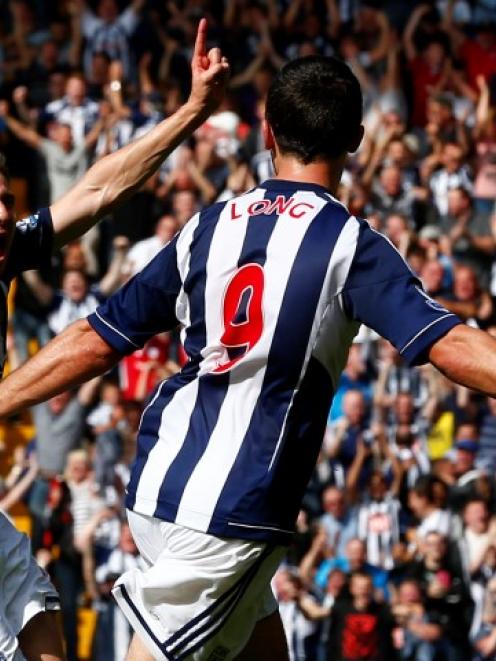 West Bromwich Albion's Zoltan Gera (L) celebrates his goal against Liverpool with Shane Long...