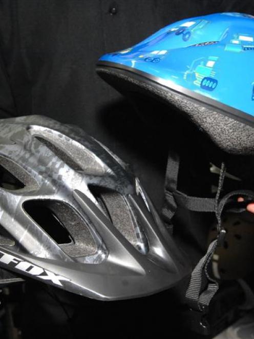 Whether they cost $219 (left) or $59, cycle helmets in New Zealand are required to meet only a...