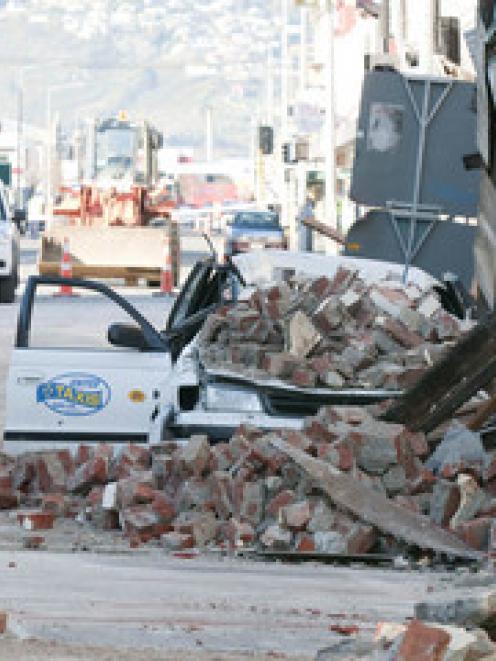 Damage from the early morning magnitude 7.4 earthquake which struck about 30km west of the city,...