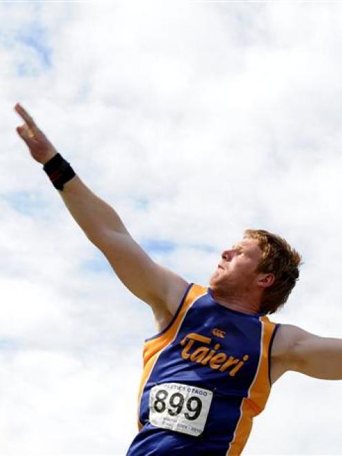 William Hubber on his way to winning the junior men's shot put at the Otago championships at the...