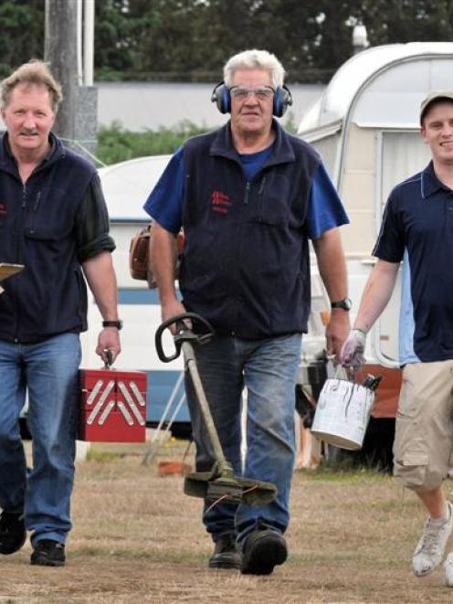 Willing Workers (from left) John Scott, Brian Short and Andrew McCrae are ready to carry out...