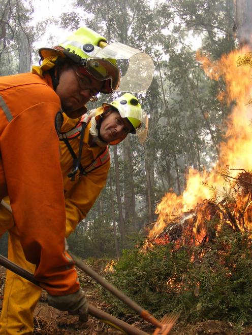 Working on a firebreak this week in the Yarra State Forest, Victoria, are Dunedin volunteer rural...