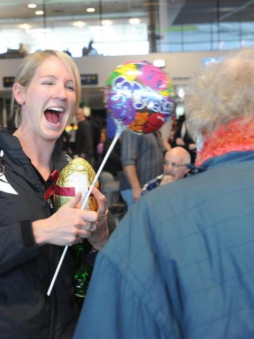 World champion cyclist Alison Shanks is greeted by her grandmother, Madelene Barkman, at Dunedin...