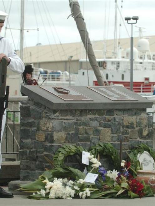 Wreaths lie at the base of a new memorial on Dunedin's Customhouse Quay to the 30 local men who...