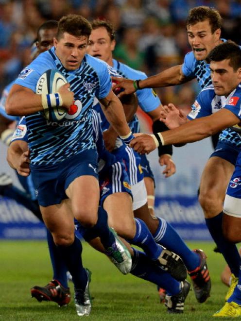 Wynand Olivier of the Bulls breaks the line against the Stormers during their Super 15 match at...