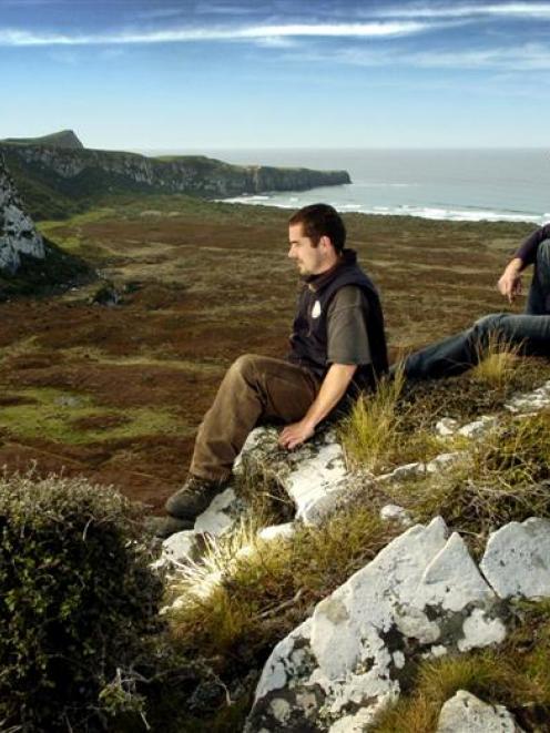 Yellow-eyed Penguin Trust ranger Leith Thomson (left) and field officer David McFarlane take in...