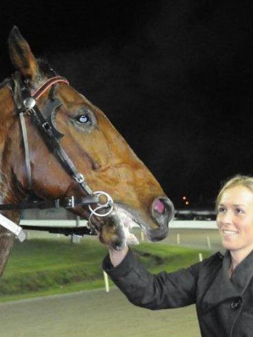 Yokozuma, the winner of two of his three starts, and co-trainer Amber Hoffman, after success at...