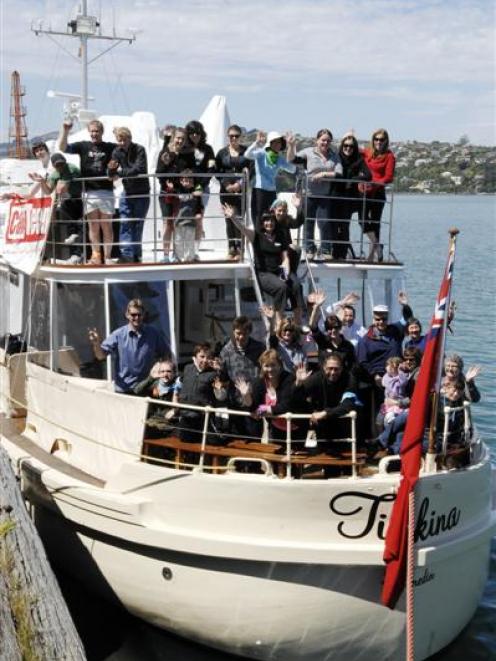 Young people and supporters prepare to go cruising on the luxury launch MV Tiakina at the weekend...
