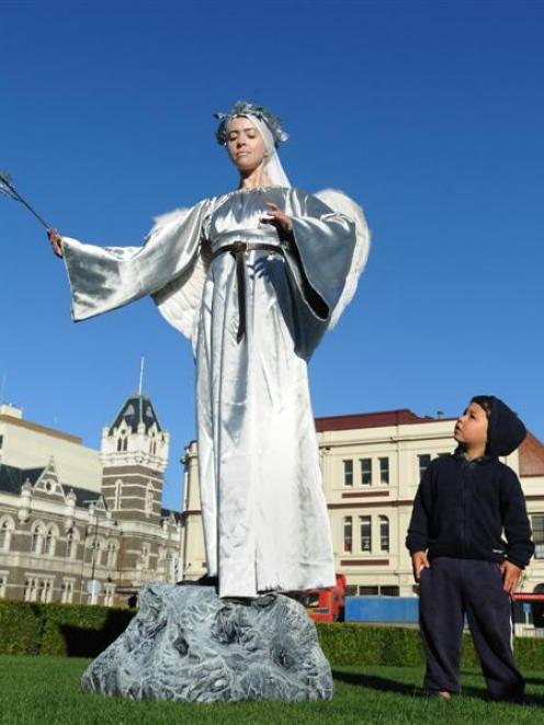 Zacharie Santana (3), of Dunedin, admires angel Natapiya Dryshchuk, of Christchurch, at the ...