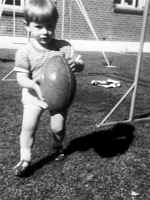 A 3-year-old  Michael ‘‘Woody’’ Woodhouse playing in the back yard of his family home in...