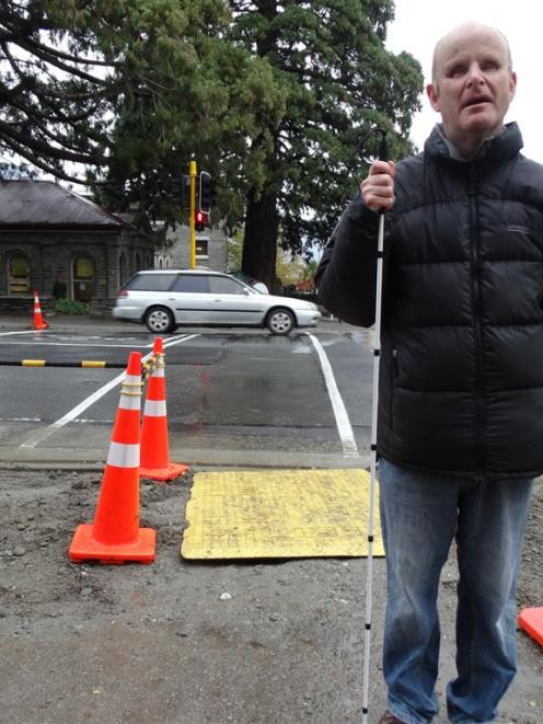 Blind Queenstown musician Mark Wilson says it has been hard for him to cross Stanley St since the...