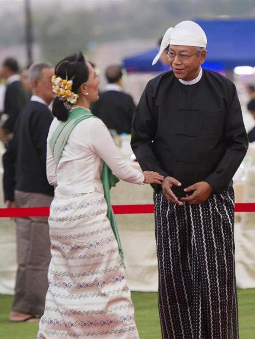 Burma’s new President Htin Kyaw welcomes National League for Democracy party leader Aung San Suu...