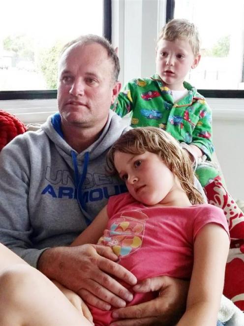 Craig Hickford with his children Grace and Toby. Photo supplied.