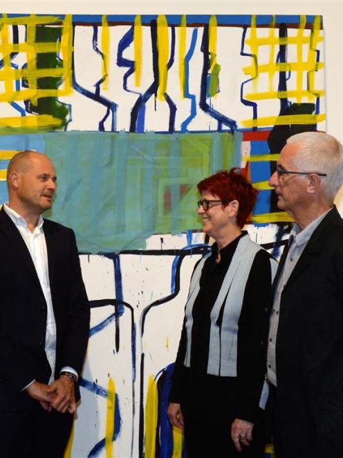 Dunedin Public Art Gallery director Cam McCracken (left) with Mary and Jim Barr in front of one...