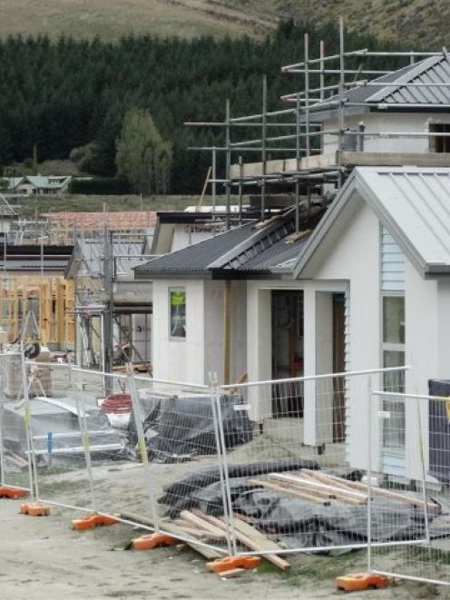 Houses being built at Queenstown’s Shotover Country subdivision. Photo by David Williams.