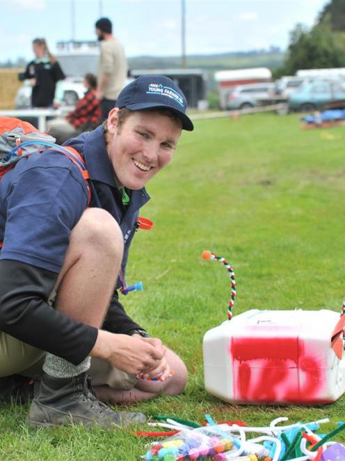 Logan Wallace takes part in the "make a letterbox" section of a Young Farmer of the Year event in...