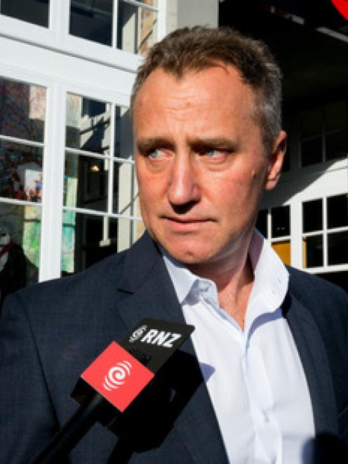 Mark Weldon leaves the MediaWorks Ponsonby Rd office with members of the board. Photo: NZ Herald