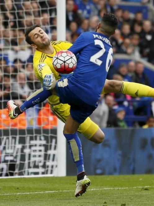 Swansea keeper Lukasz Fabianski saves an effort from Leicester City's Riyad Mahrez. Photo Reuters