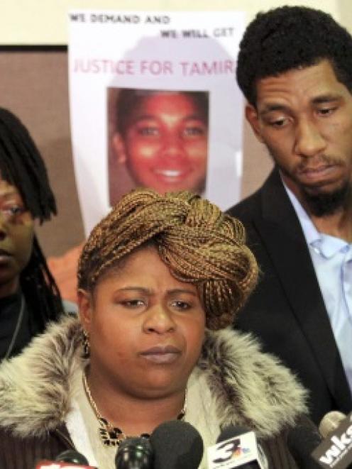 The boy's mother, Samaria Rice, (centre) with supporters. Photo: Reuters