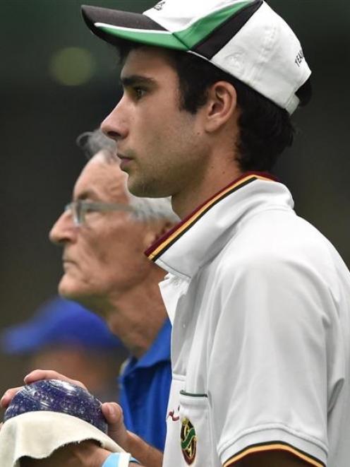 Sheldon Bagrie-Howley, of Gore (front), ponders his next move against Doug Thomas (rear) in the...