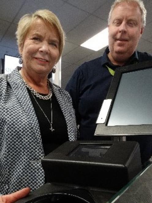 Customs Minister Nicky Wagner and Queenstown Airport operations general manager Mike Clay try out...