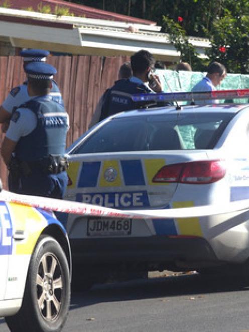 Police at the scene yesterday. Photo NZ Herald