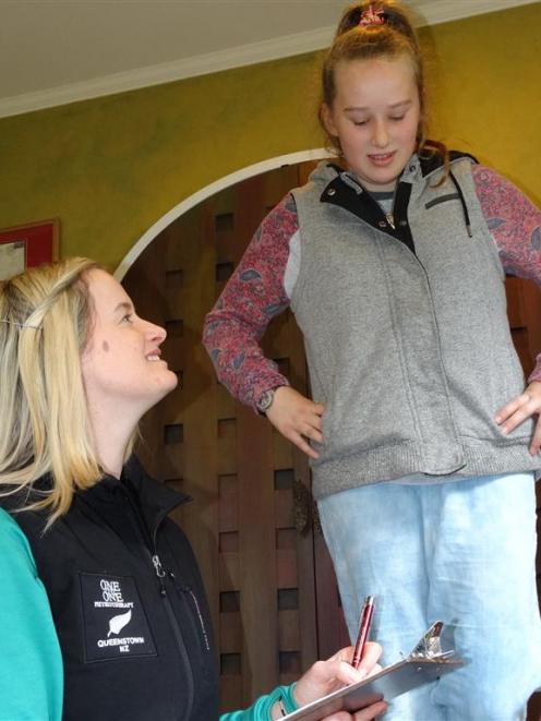 Queenstown Ice Hockey Club under-17 player Gabby Mills (13) undergoes a baseline concussion test...
