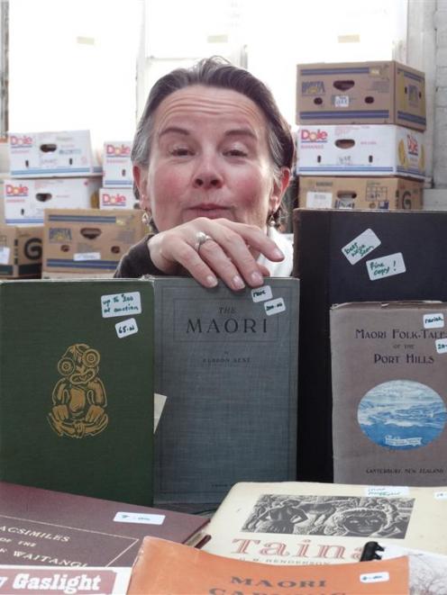 Alison Cunningham displays some rare New Zealand books that will be available at The Star Regent...