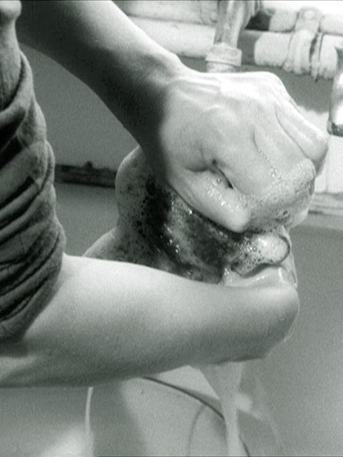 Video still from ‘‘The Unswept Floor’’, by Kate Davis.