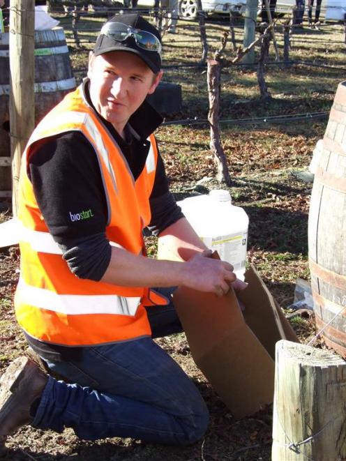 Eventual winner Mike Winter (29), of Amisfield Winery gets to grips with winebox construction...