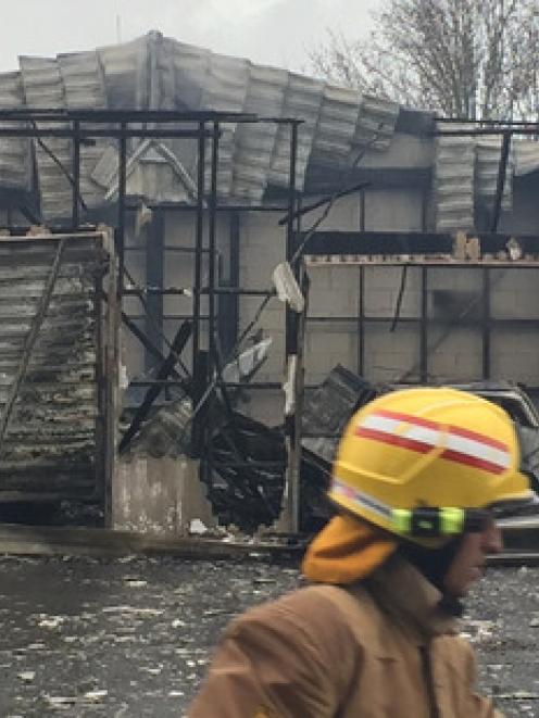 Firefighters at the scene in Latham Ave, Pakuranga. Photo: NZ Herald