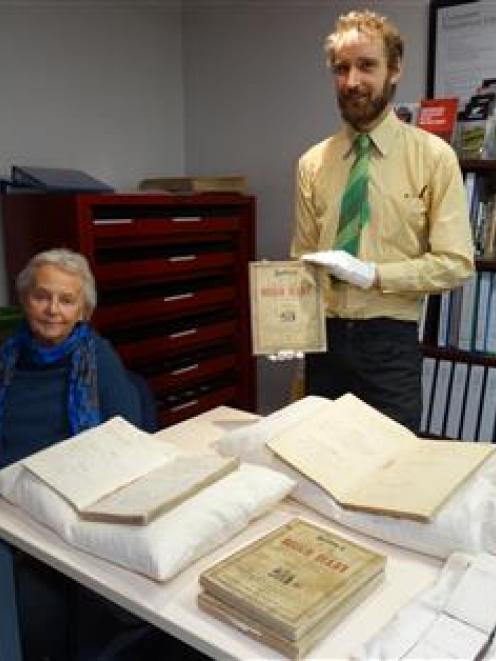 Heather Sutton and Waitaki District Archive curator of archives Chris Meech with diaries from...