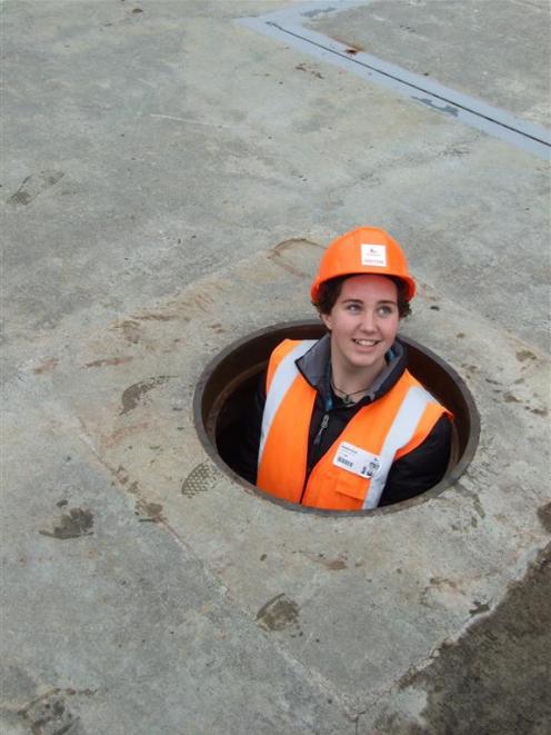 Maddie Scott (14), of Cromwell College, looks at work from new angle. Maddie was one of about 35...