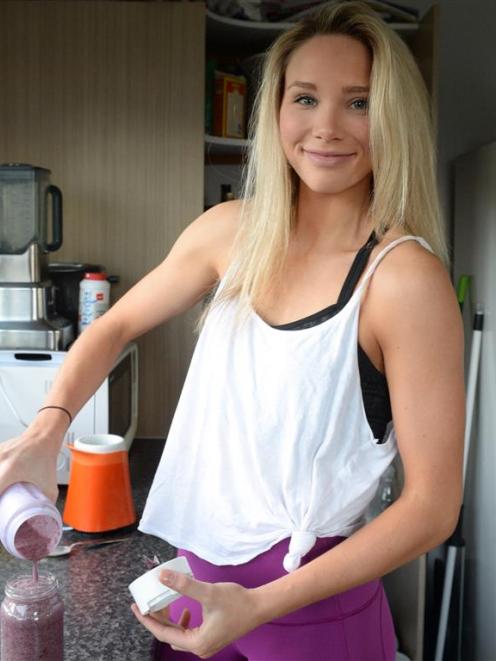 Otago University student Charlotte Woolford (21) prepares a vegan blueberry and chia seed...