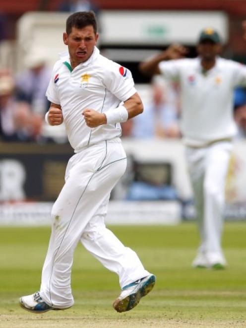 Pakistan's Yasir Shah celebrates the wicket of England's Gary Ballance. Photo Reuters