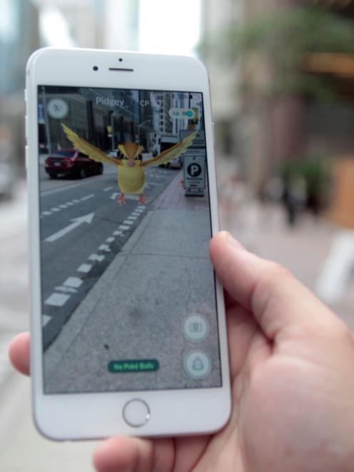 Pokemon Go has become an instant hit. Photo: Reuters