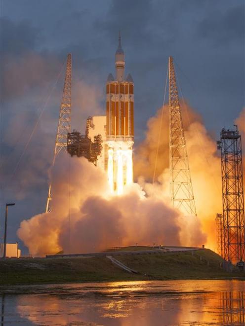 The Lockheed Martin-built Orion spacecraft launches from Cape Canaveral, Florida, aboard a United...