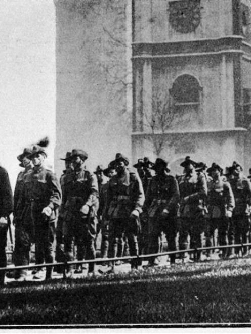 The long line of Anzacs on their way to Westminster Abbey on Anzac Day. The King and Queen were...