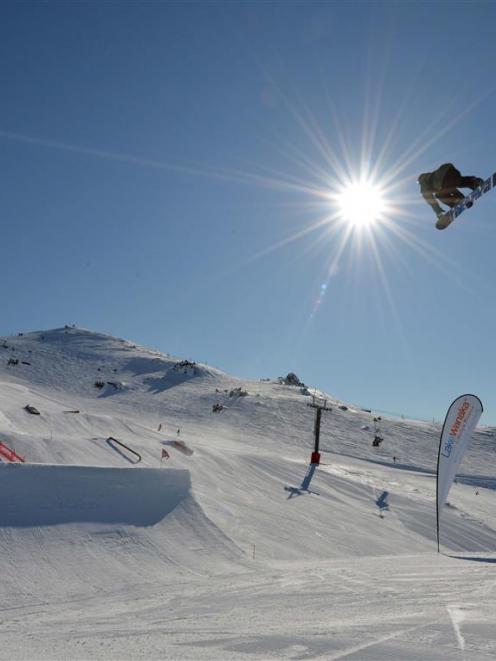 Tourism leaping ahead . . . a snowboarding competition at Cardrona last season. PHOTO: STEPHEN...