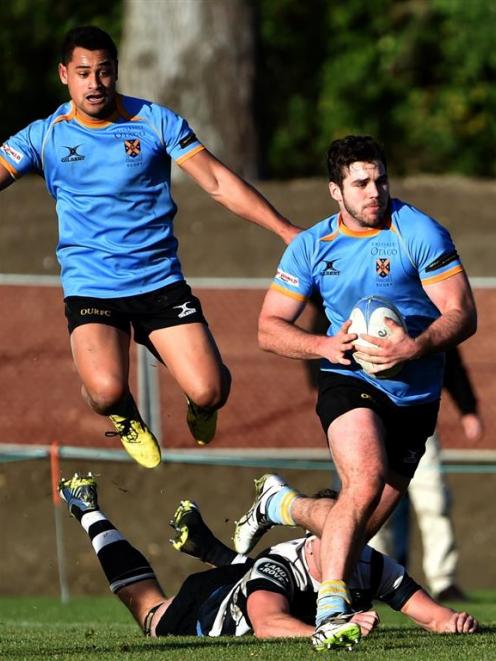 University A centre Shae Tucker gets past Southern lock Ryan Thompson as University winger Fa...