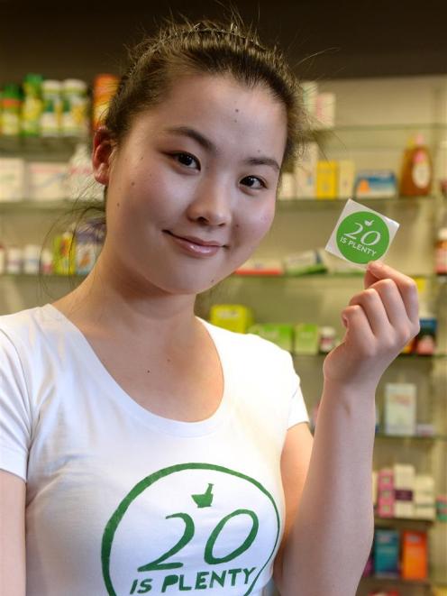 University of Otago senior pharmacy student Harumi Tanimura (22) is promoting a ''20 is Plenty'' campaign to boost awareness of the prescription card subsidy scheme. Photo by Linda Robertson.