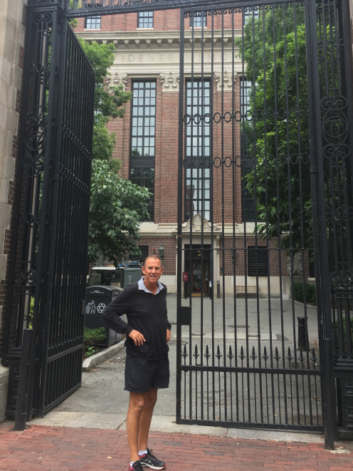 Fairfield School principal Andy Larson outside the gates of Harvard University on his recent...