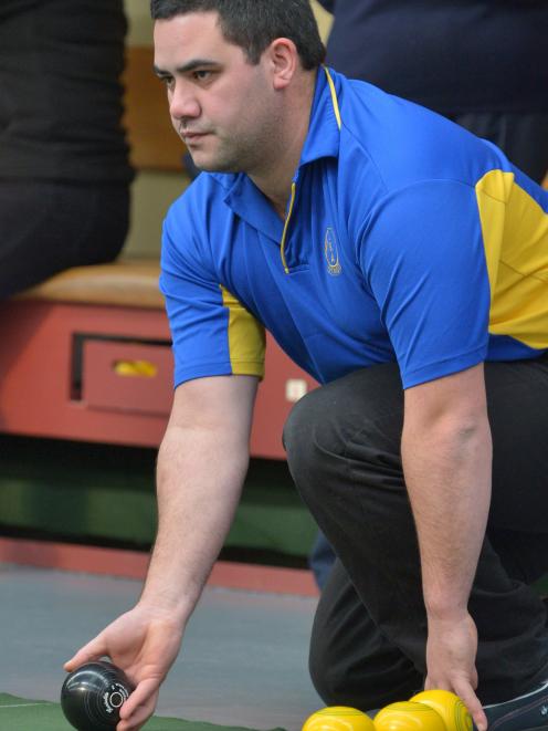 Otago indoor bowler Daniel French delivers a bowl at the Otago Indoor Bowls stadium in Dinunedin...