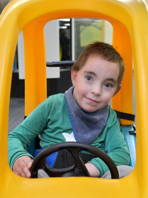 Carter Helliwell (5) steers a toy car at Dunedin Hospital yesterday. Photo: Gerard O'Brien