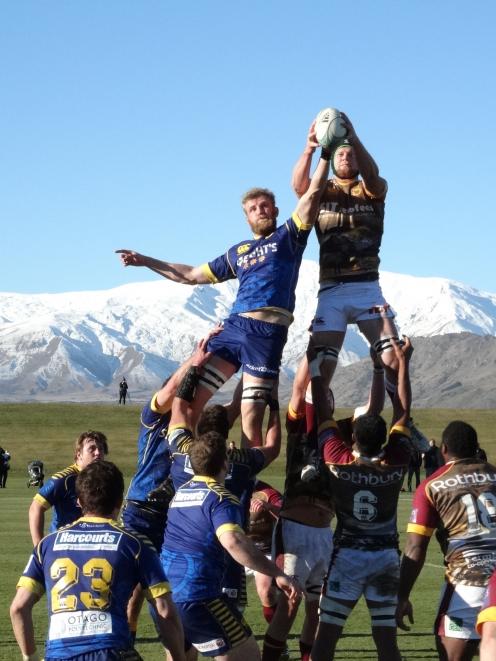 Otago lock Josh Dickson contests possession with Southland opposite Mike McKee at a lineout in...