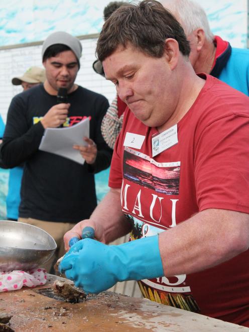 Shane Wixon, of Ngai Tahu Fisheries, on his way to winning the men’s oyster opening competition...
