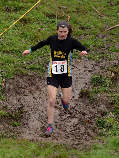 Sabrina Grogan negotiates the mud during the Leith cross-country relays earlier this year. Photo:...